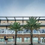 Front view of commercial glass windows on Blue Wahoos Stadium by Merritt Glass