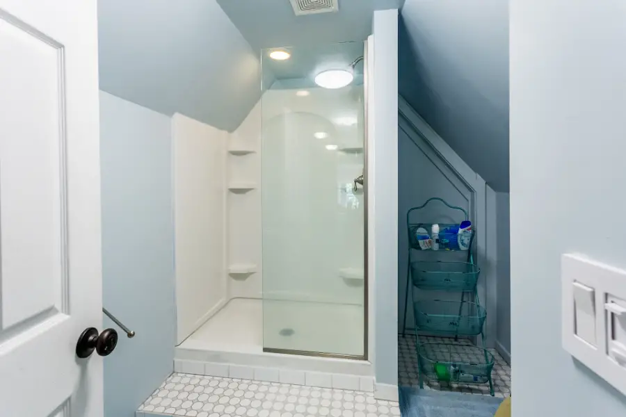 Custom-single-panel-glass-shower-enclosure-compressed